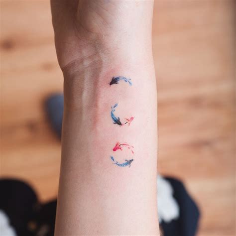 Tokyo Ink koi fish wrist tattoo Pisces constellation 🌌