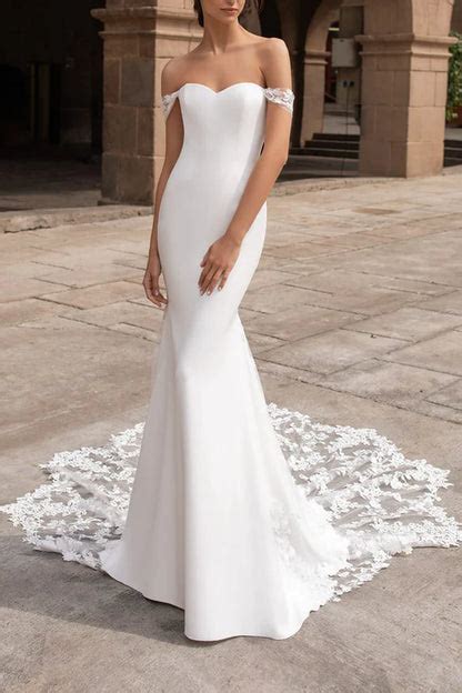 Elegance Redefined: The Enchanting Fishtail Wedding Dress with an Alluring Off Shoulder Design