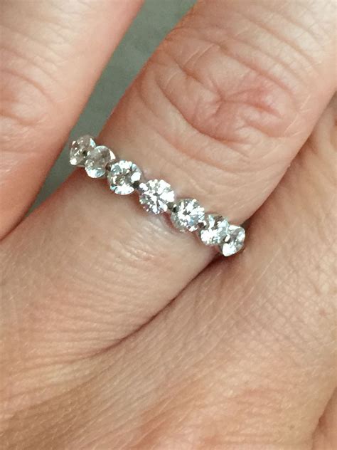 Enchant Your Love Story with the Marble-like Splendor of Floating Diamond Wedding Band by Blue Nile