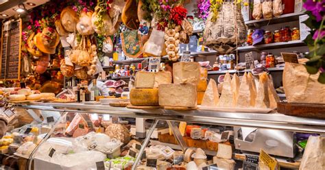 A small group sampling delicious local delicacies on a food tour in Florence