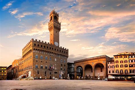 The vibrant Piazza della Signoria, featuring the Palazzo Vecchio and Neptune statue