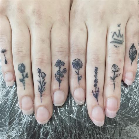 Flower Finger Tattoo