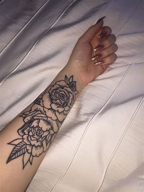 30 Delicate Forearm Flower Tattoo Designs & Ideas
