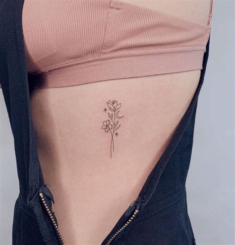 Flower Rib Tattoo