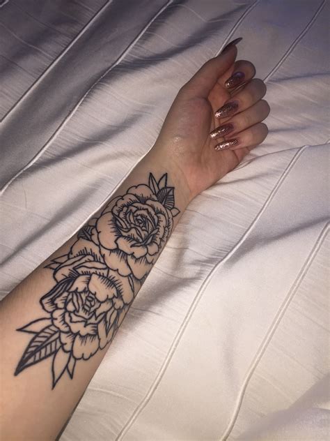 Flowers On Arm Tattoo