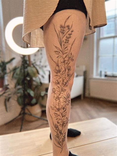 Flowers On Leg Tattoo