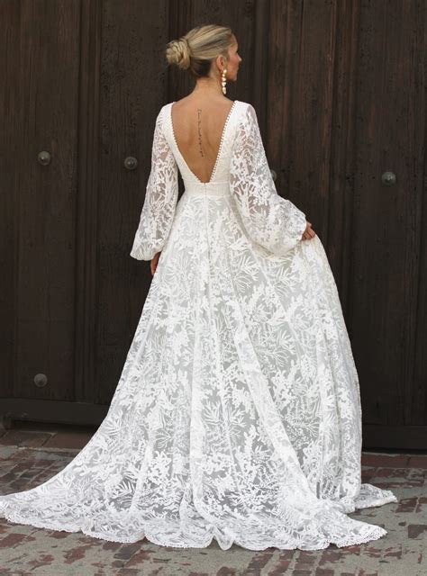 Unleash Your Inner Bohemian Goddess with Our Dreamy Flowy Wedding Dress Collection.