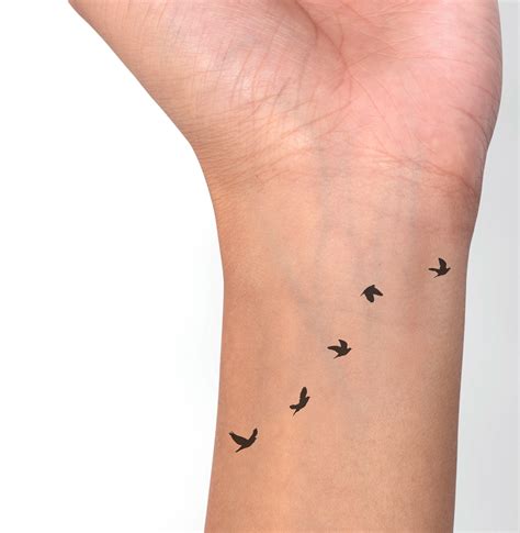 Flying Bird Tattoo