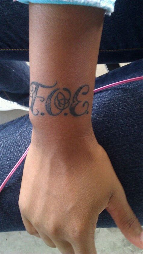 My 4th tattoo "F.O.E." means Family Over Everything