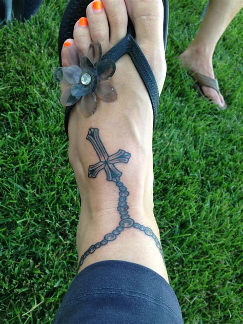 Small Cross Tattoo On Foot