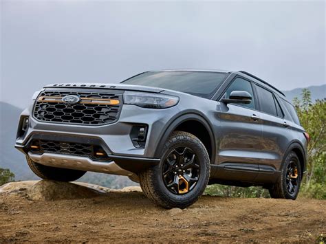 Ford Explorer Timberline model driving on a rocky trail, showcasing its rugged features