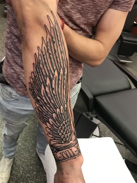 Forearm Wing Tattoo Designs