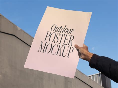 Download Free Man With A3 Poster Mockup PSD Generator