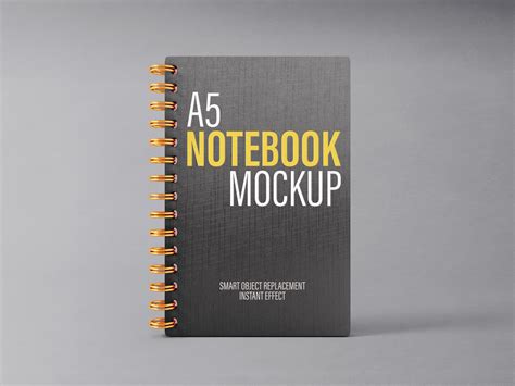 Download Free Notebook in a Hand Mockup PSD Yellowimages