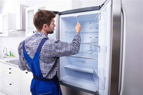 Freezer Repair Technician Checking a Freezer