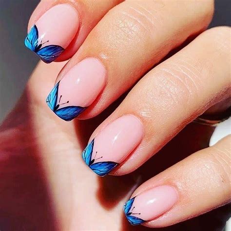 French Tip Nails With Butterfly Design: A Trending Nail Art In 2023