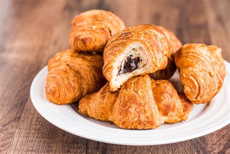 French eating Croissant