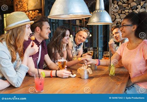 Friends talking in pub