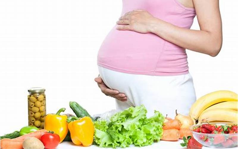 Gambar Ibu Hamil Yang Sedang Memasak Makanan Sehat