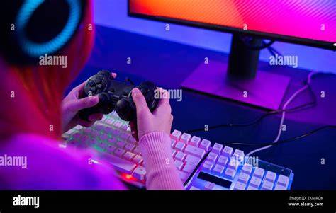 Alt Text: Gamer Using a Controller to Play a Free PC Game