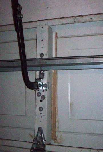Garage Door Track Bracket Repair - Damaged Bracket