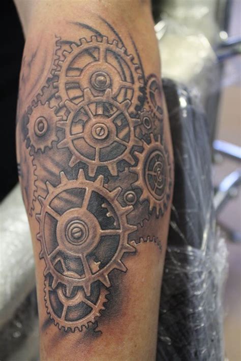 Skin rip gears mechanical tattoo. Custom design by