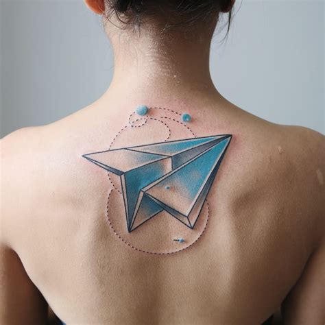 Geometric Paper Airplane Tattoo