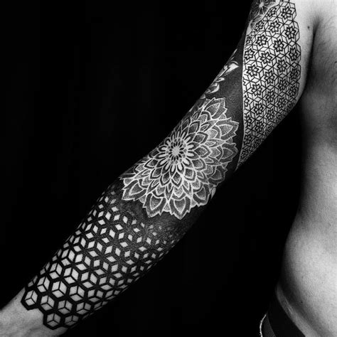 10 Artists Who Create Striking Geometric Tattoos Spanning