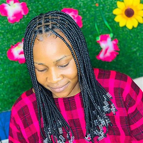 Getting Your Knotless Box Braids With Beads Done