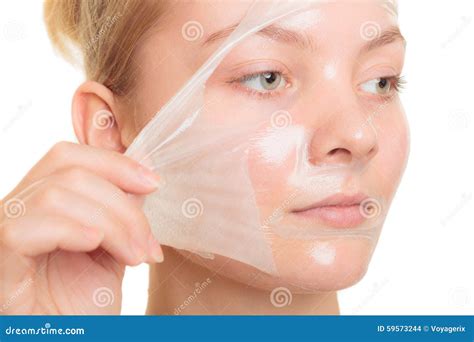 Girl Peeling Off Face Mask