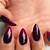 Glamorous Enigma: Mesmerize the World with Your Dark Plum Nails
