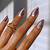 Glamorous Gilded: Metallic Nail Trends for Fall 2023