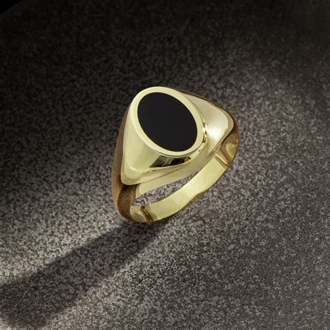Gold Ring With Black Stone