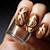 Golden Mirage: Nail Designs for a Birthday Look That Mesmerizes