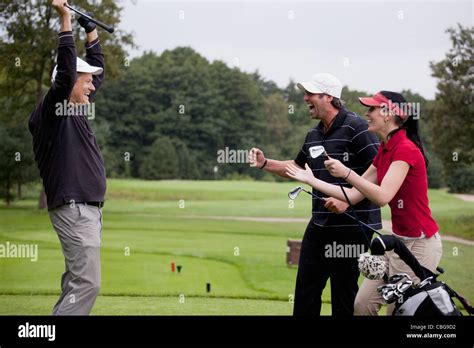 Golfers Celebrating a Win