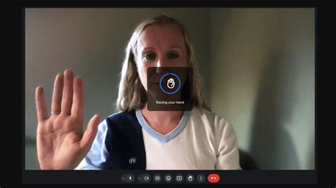 Google Meet hand raise gesture