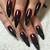 Goth Glam: Channel Your Inner Vamp with Dark Plum Nails