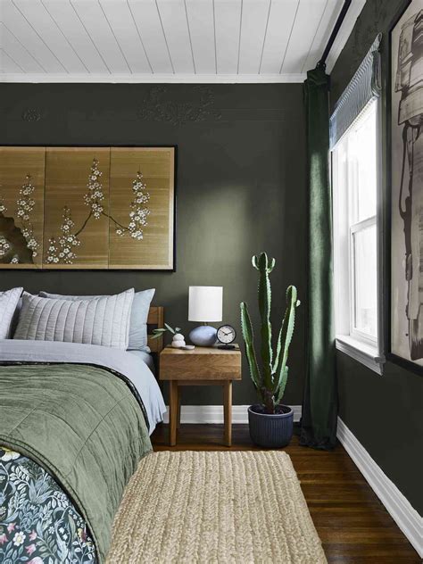 Green and grey bedroom with accent wall