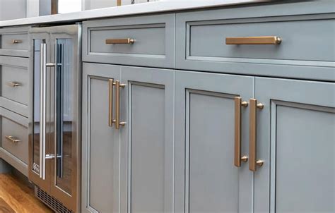 Unveiling the Beauty of Sophisticated Grey Kitchen Cabinets with Timeless Bronze Hardware