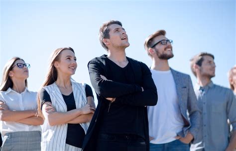 Group Looking Up At Landmark
