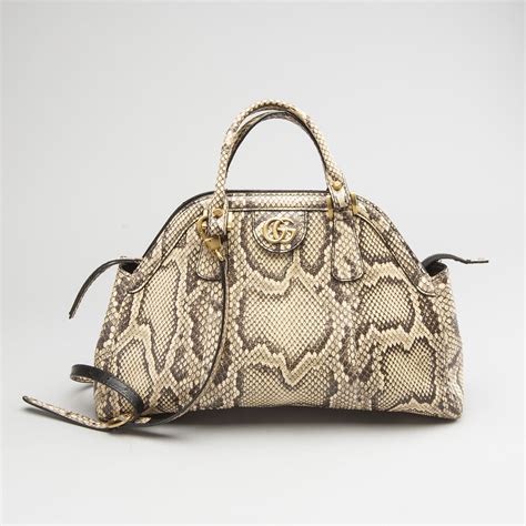 Gucci's Serpentine Sensation: Unleashing the Elegance of Snake Skin in a Glamorous Bag
