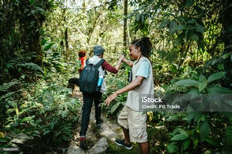 Guide Helping Tourist