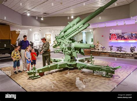 Guide explaining exhibits Asker Museum