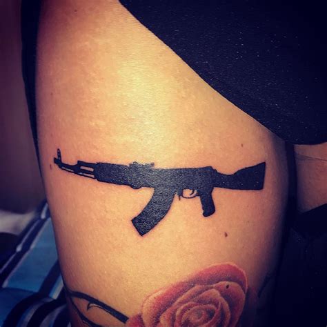 45 Amazing Gun Tattoo Designs