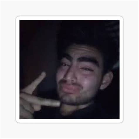 Guy Crying Holding Peace Sign