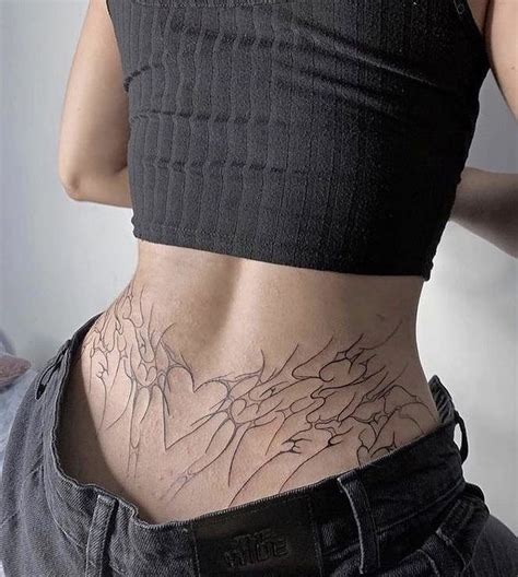 Guy Lower Back Tattoo