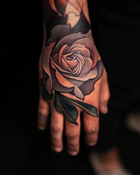 Rose Tattoo on Hand Rose hand tattoo, Rose tattoos, Tattoos