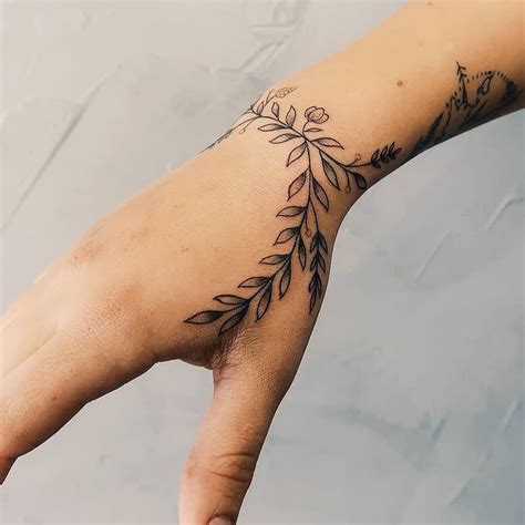 Hand Flower Tattoos