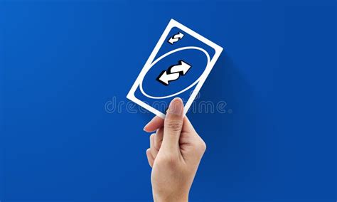 Hand Holding Uno Reverse Card