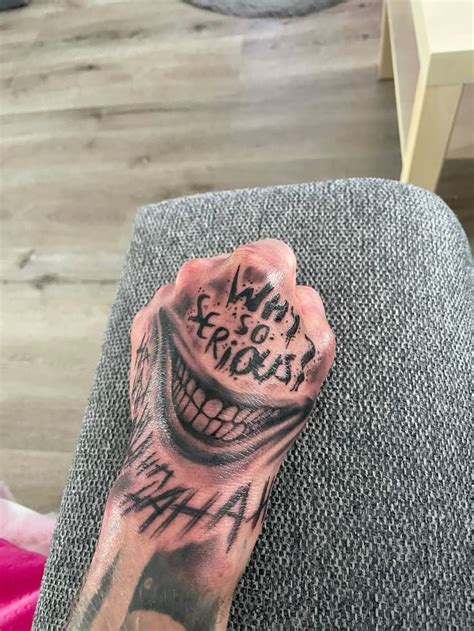 Hand Joker Tattoo
